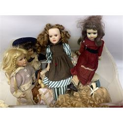 Vintage Paddington bear, with red duffle coat and hat and green Wellington boots, together with a collection of porcelain dolls, paddington H48cm 