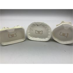 Twelve Coalport bone china pastille burner cottages, to include Fortune Towers, Summer Palace, The Vinery, Springtime Cottage, Dream Villa, Half Moon House, etc, all with original boxes and some with certificates 