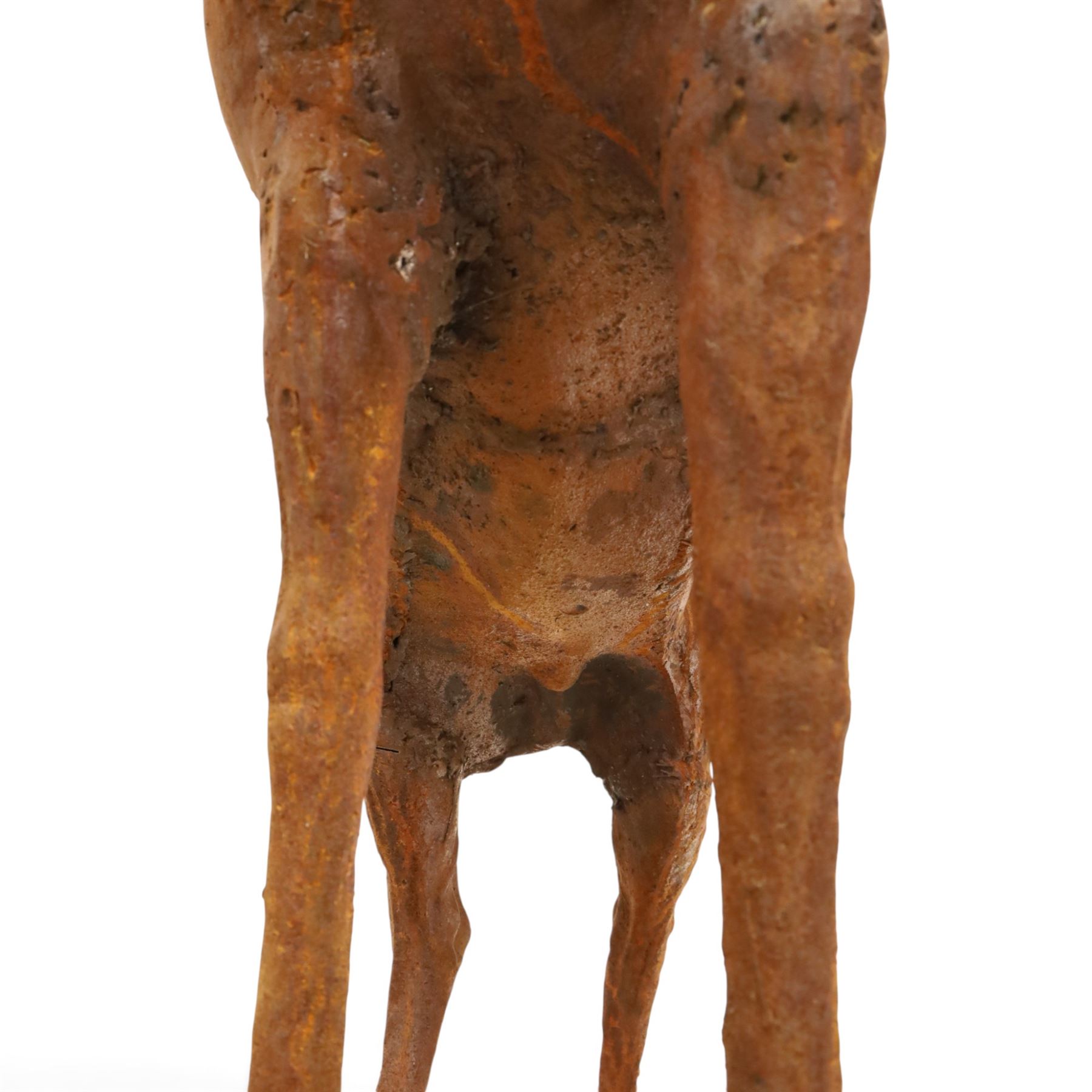 Pair of cast iron stags, upon a on moulded rocky plinth, standing alert 