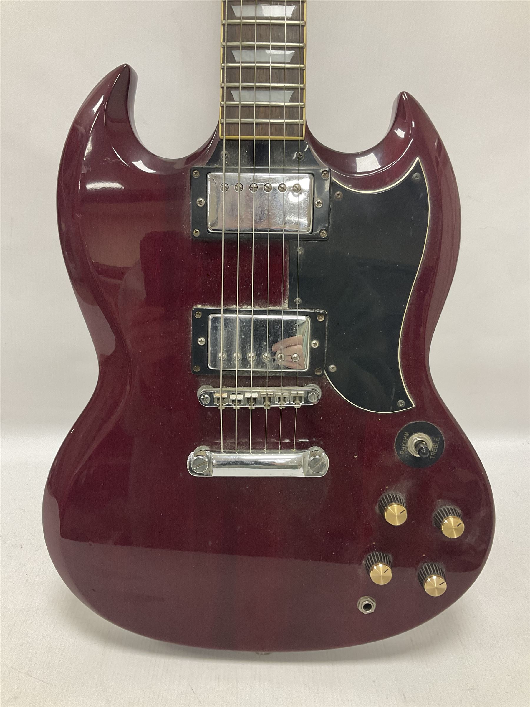 Gibson Epiphone SG six string electric guitar, with cherry red mahogany finish and black scratch guard, L102cm