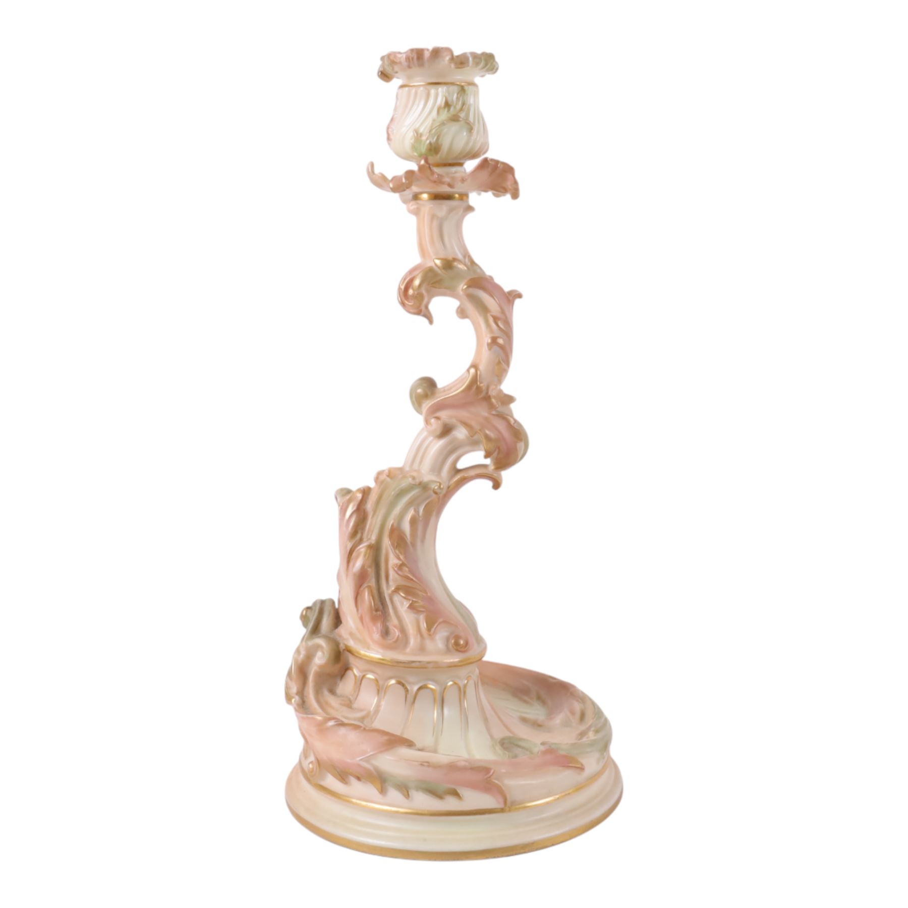 Royal Worcester pair of blush ivory candlesticks, modelled in the rococo style of scrolling foliate design upon a circular spreading base, gilt-heightened, puce mark to base and numbered RN160134 and 1478, H32cm