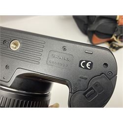 Four camera bodies, to include, Ricoh KR-10 serial no. 38826, Pentax MZ-M serial no. 4185969 with 'SMC Pentax- M 1:3.5 28mm' lens, Canon EOS500 serial no. 080927, with 'Sigma Zoom 100-300mm 1:4.5-6.7 DL'  lens etc, with other camera lenses and equipment 