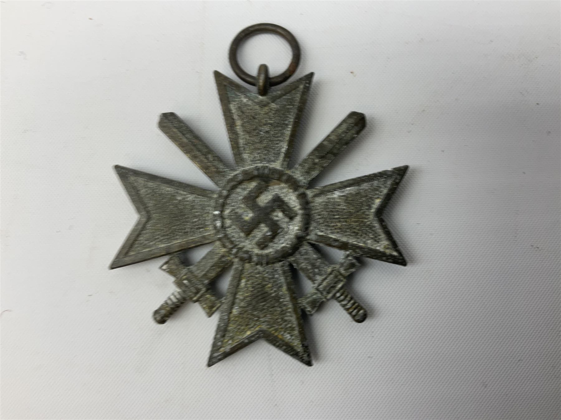 WW2 German Eastern Front Medal awarded to those who served on the German Eastern/Russian Front during the Winter Campaign period of 15th November 1941 to 15th April 1942 with original ribbon; and German War Merit Cross with swords 2nd Class (2)