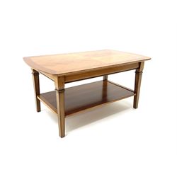 Rectangular walnut coffee table, cross banded top, square tapering supports joined by under tier   