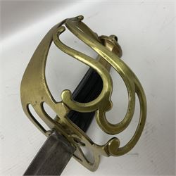 Late 18th century sword, the Spanish 79.5cm curving fullered blade engraved with the Royal Cypher, battle trophies and 'Viva Espania' banner, French Sabre de Mineur brass three-bar hilt with ebonised reeded grip L93.5cm overall (no scabbard)