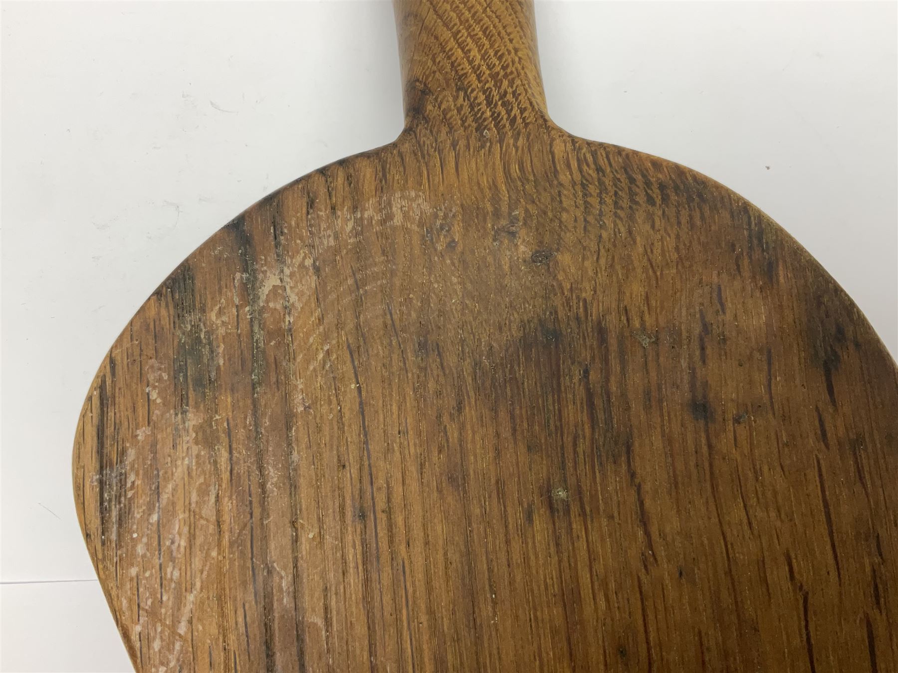 Mouseman - oak kidney-shaped cheeseboard, the handle caved with mouse signature, by the workshop of Robert Thompson, Kilburn 