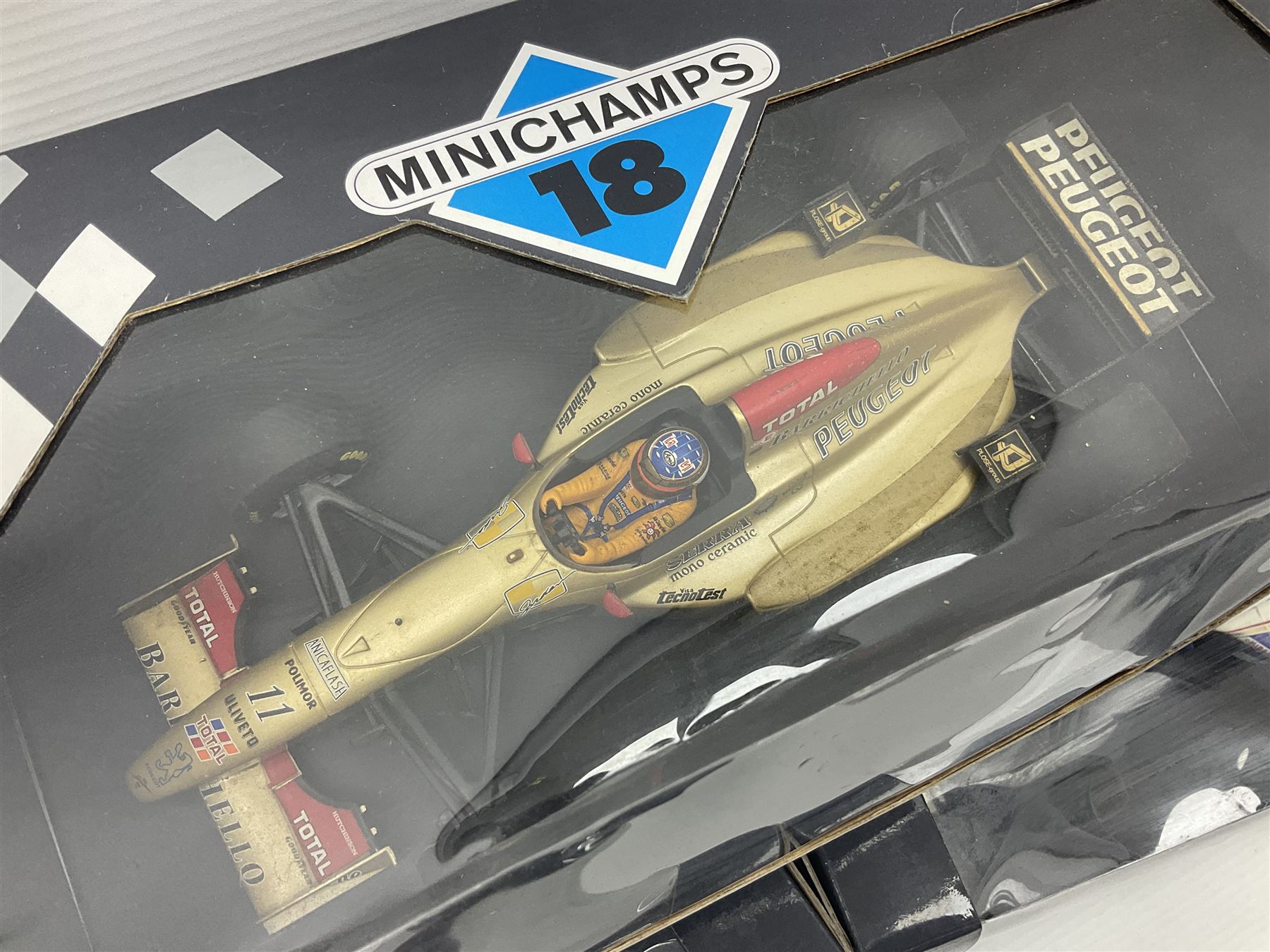 Three Minichamps '18' 1:18 scale die-cast racing cars - Jordan Peugeot 196 1996 R. Barrichello; Benetton Renault B196 G. Berger; and Williams Renault FW18 D. Hill; all boxed (3)