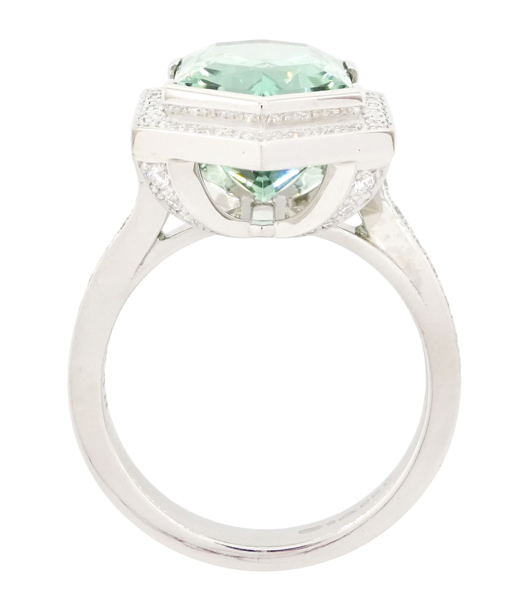Platinum African Paraiba tourmaline and diamond ring by Scarab London, single fancy double bullet cut tourmaline of approx 8.37 carat, with round brilliant cut diamond surround and diamond set shoulders, London 2023, total diamond weight approx 1.05 carat, with Alan Poultney Gems report