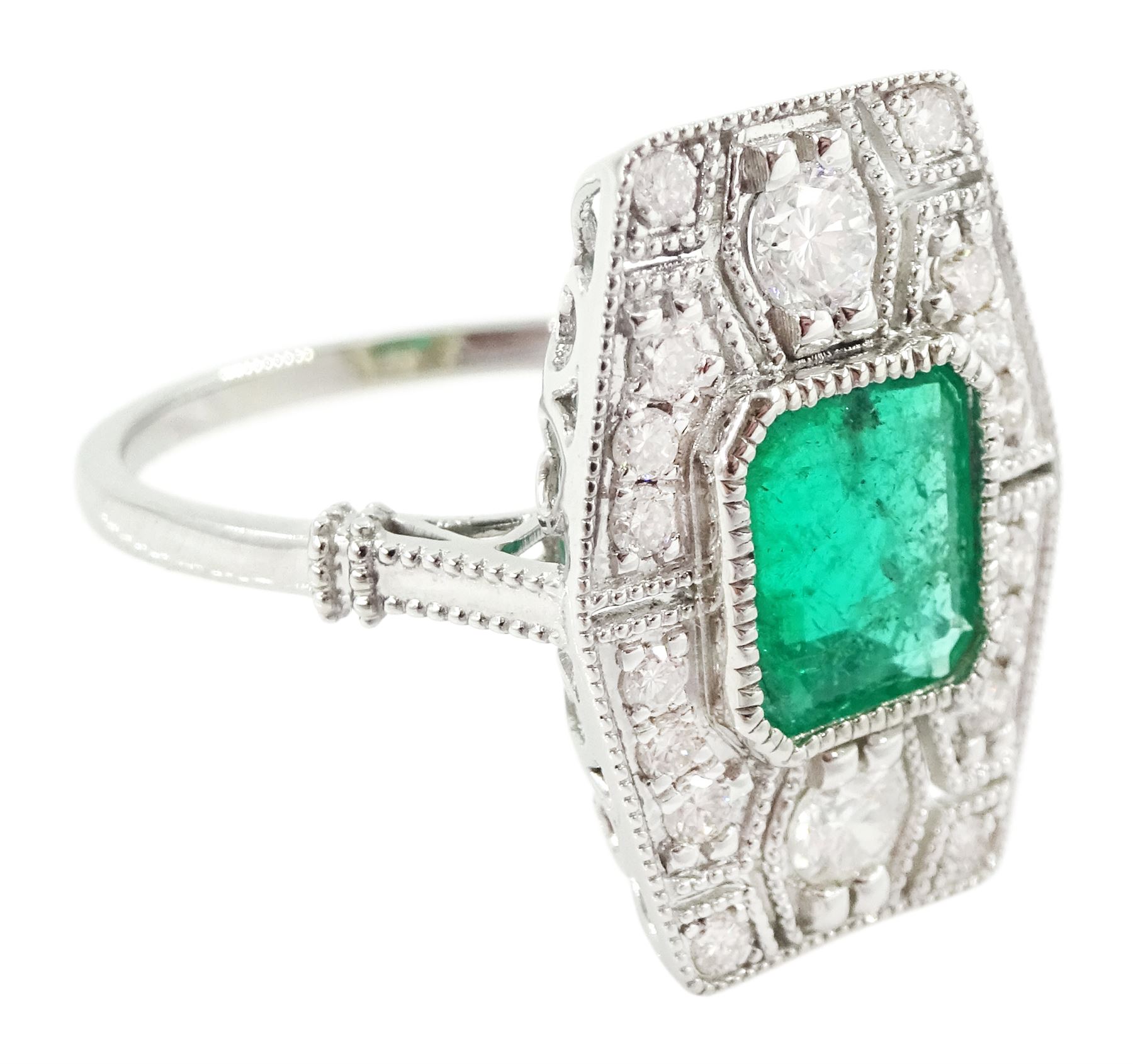 Platinum emerald and diamond dress ring, milgrain set with a single octagonal cut emerald of 1.26 carat, surrounded by round brilliant cut diamonds in an pierced design setting, stamped PT 950, total diamond weight 0.47 carat
