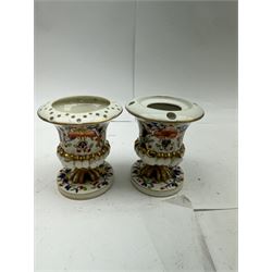 Pair of Staffordshire figures modelled as chained Dalmatians seated upon cobalt blue oval bases, H13cm, together with a Staffordshire pastille burner modelled as a castle, H12cm, a pair of 19th century Derby potpourri pots (lacking covers), and an 18th century blue and white tea bowl 