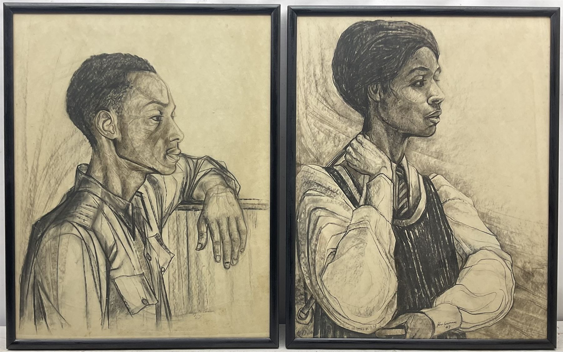 African School (20th century): Male and Female Portraits, pair charcoals indistinctly signed and dated 1967, 59cm x 46cm (2)