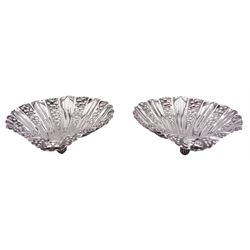 Pair of late Victorian silver bon bon dishes, of shell shaped from, embossed with flower heads, hallmarked Atkin Brothers, Sheffield 1899, L12cm, approximate weight 3.89 ozt (121 grams)