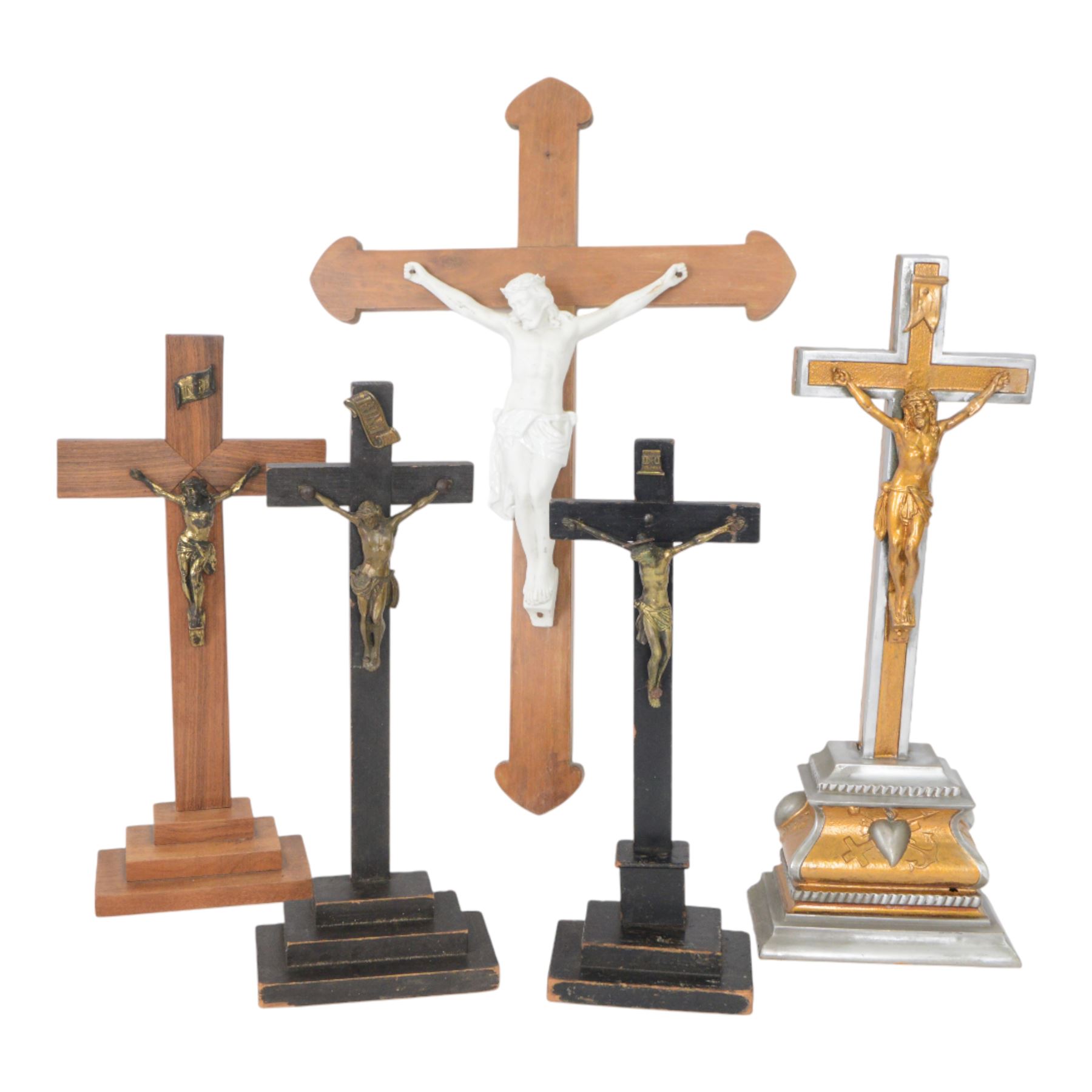 Collection of crucifixes, including wooden and meal examples, largest H63cm