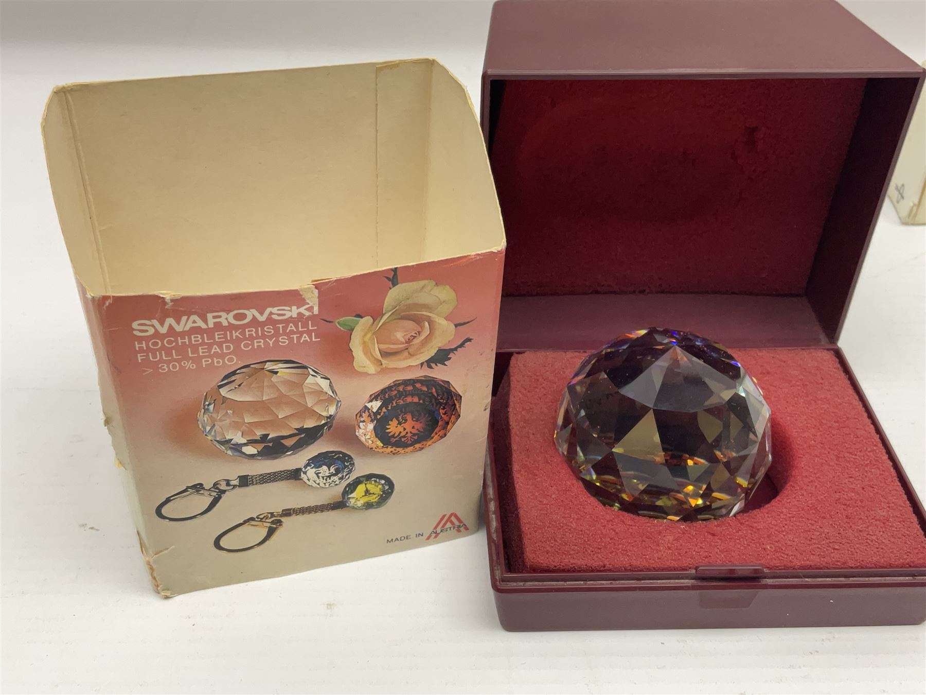 Three fountain pens, to include Conway Stewart 'Dinkie 550' and 'Conway 57' and a Parker 'Slimfold', all with 14ct gold nibs, together two roller ball pens, including a Parker example and a Swarovski Crystal paperweight