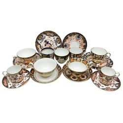 Collection of Royal Crown Derby Imari pattern tea and coffee wares, to include no 1128 teacup and saucer, no 2451 teacup trio, no 8540 teacup and saucer,  pair of no 2451 coffee cans and saucers, no 7760 teacup and saucer, etc, all with painted or printed marks beneath, date cyphers for early 19th century and later (18)