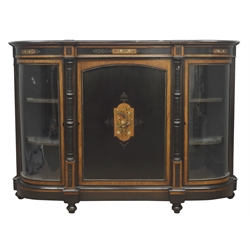  Victorian satin wood cross banded ebonised credenza, frieze and central door painted with winged inset, enclosed by a pair of glazed doors, turned ebonised columns and brass bedded detail on bun feet, W154cm, H110cm, D45cm  