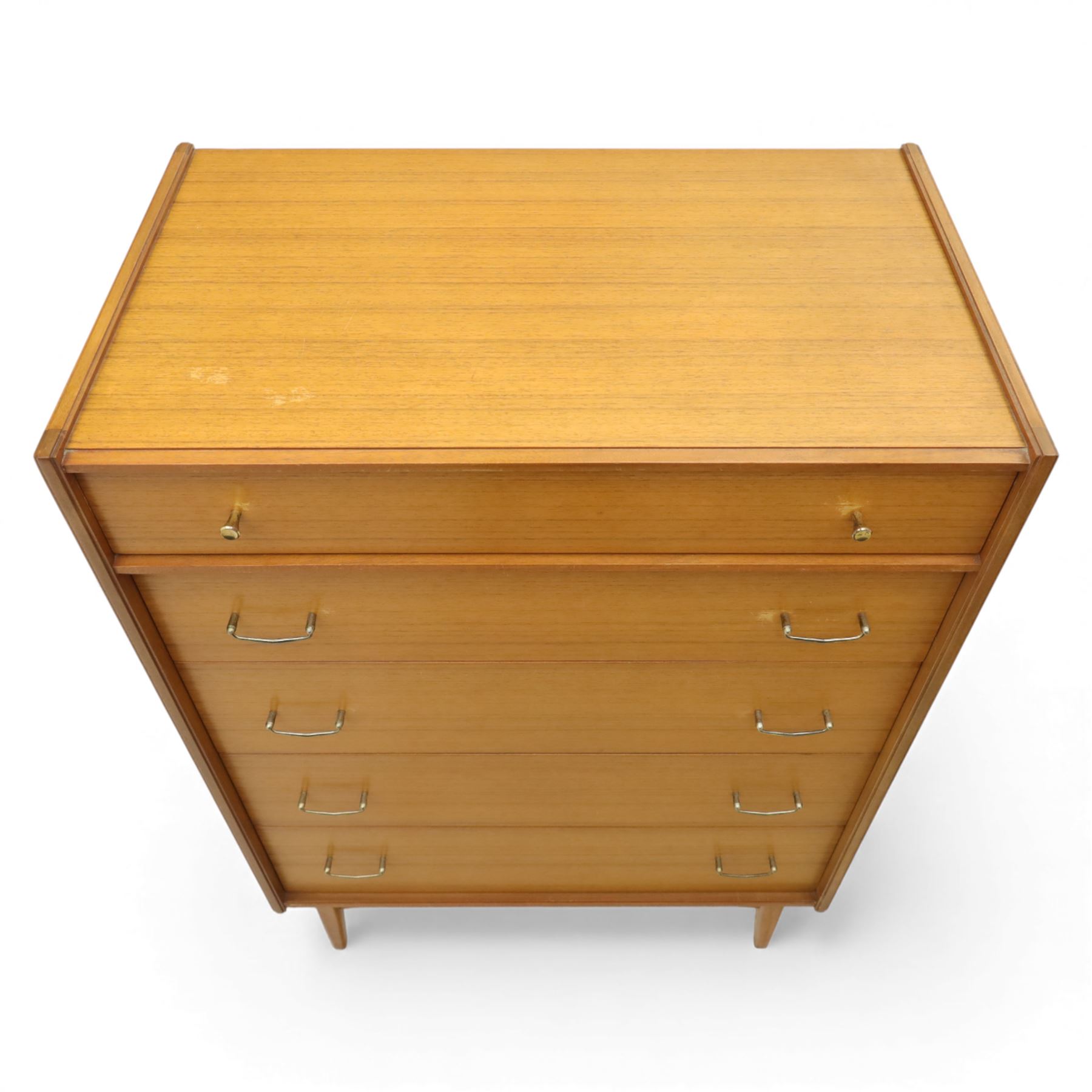 Golden Key By Palatial Ltd - mid-20th century teak chest of five drawers, rectangular top over a bank of graduating drawers fitted with brass loop handles, raised on tapering support