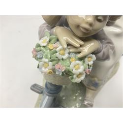 Lladro figure, In No Hurry, modelled as a girl on a tricycle, sculpted by Francisco Polope, with original box, no 5679, year issued 1990, year retired 1994, H15cm