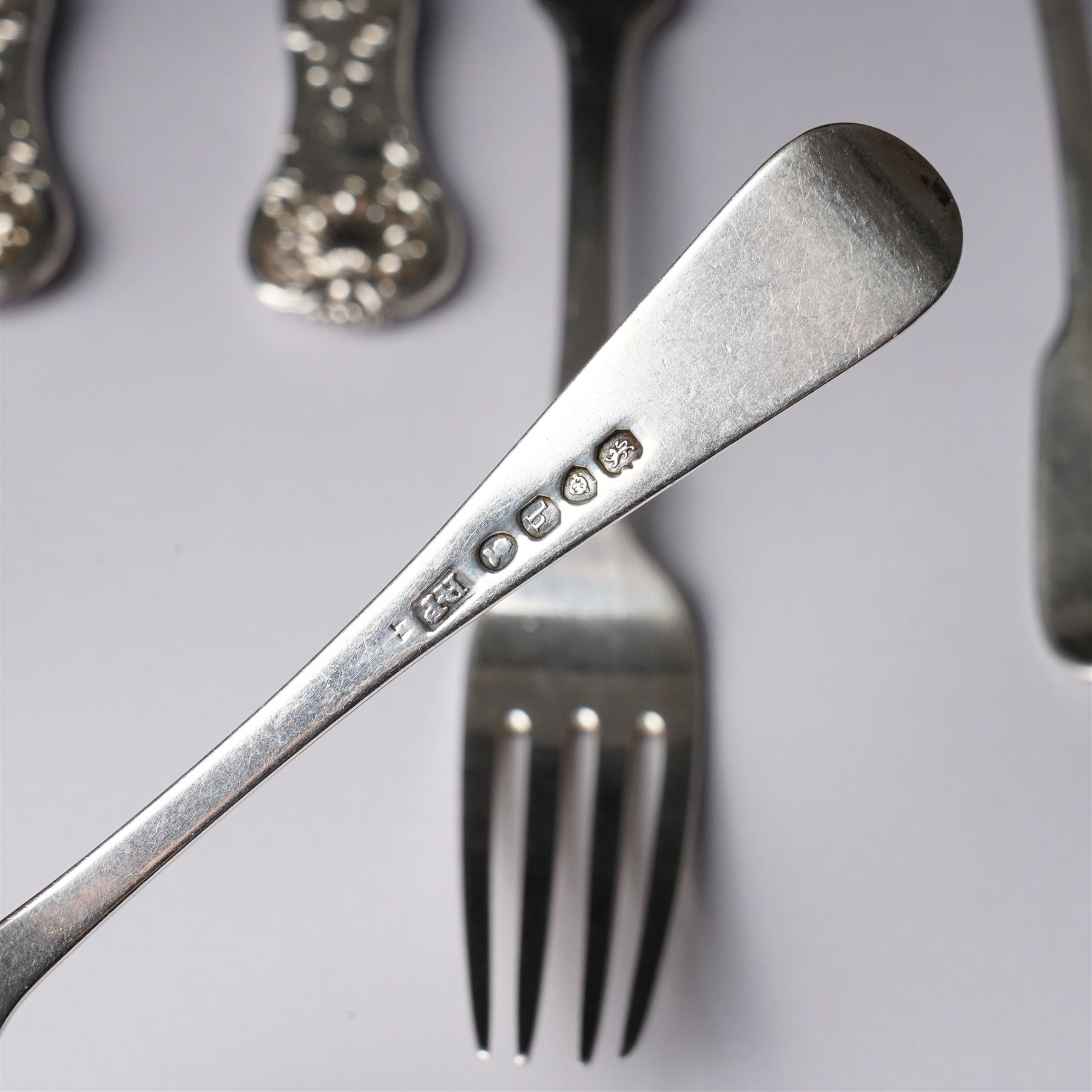 Pair of George IV silver fiddle pattern dessert forks, London 1824, another pair London 1828 and seven other 19th century silver dessert forks various dates and makers (11)