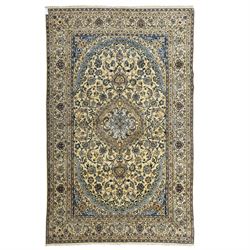 Central Persian Nain hand-knotted carpet, ivory ground, with silk highlights, centred by a...