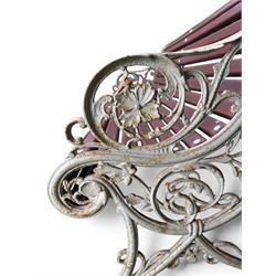 Large late Victorian cast iron garden bench, serpentine form with scroll back and seat, slatted with mahogany stained Sapele