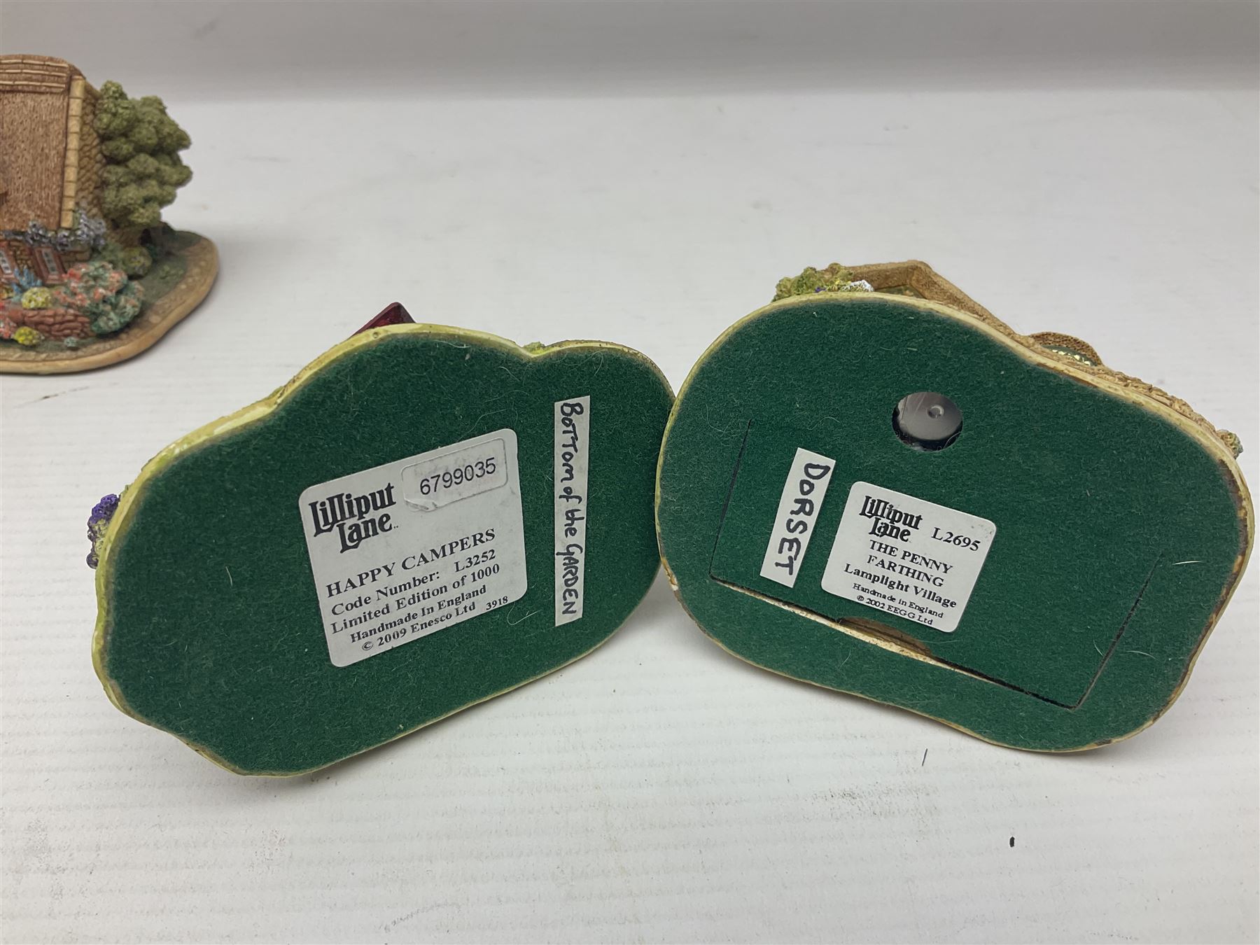 Eighteen Lilliput Lanes, including The Penny Farthing, The Pigsty, Borrowdale School, Fairy Cake Tearoom, An Apple a Day,Ladybird Cottage etc, all with original boxes 