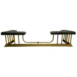 Victorian design brass telescopic extending club fire fender, the corner seats upholstered in buttoned green fabric over plain balustrade, on moulded base with floral cast corner brackets 