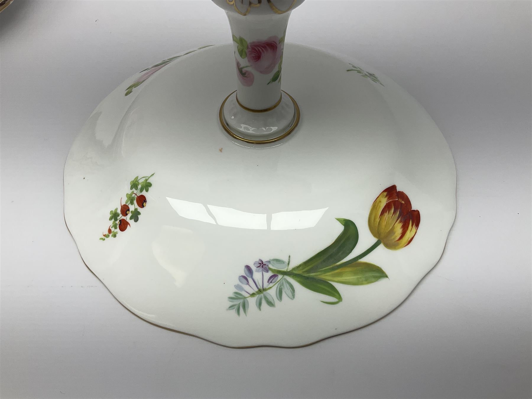 Victorian Copeland, Botanical dessert service, decorated with floral sprigs to the centre with a pink and gilt border, comprising five comports and seven plates, largest comport H20cm, plate D22cm