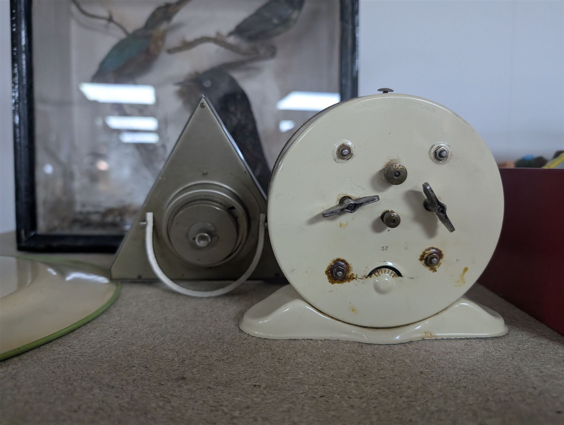 Three Smiths children's alarm clocks, including Noddy, two school adding clocks, Smiths ceramic plate wall clock, Francis Early Bird clock and an Art Deco triangular clock