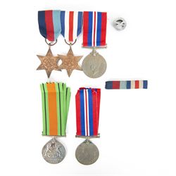Trio WWII medals comprising 1939-45 Star, French and German Star and War Medal on medal ba...