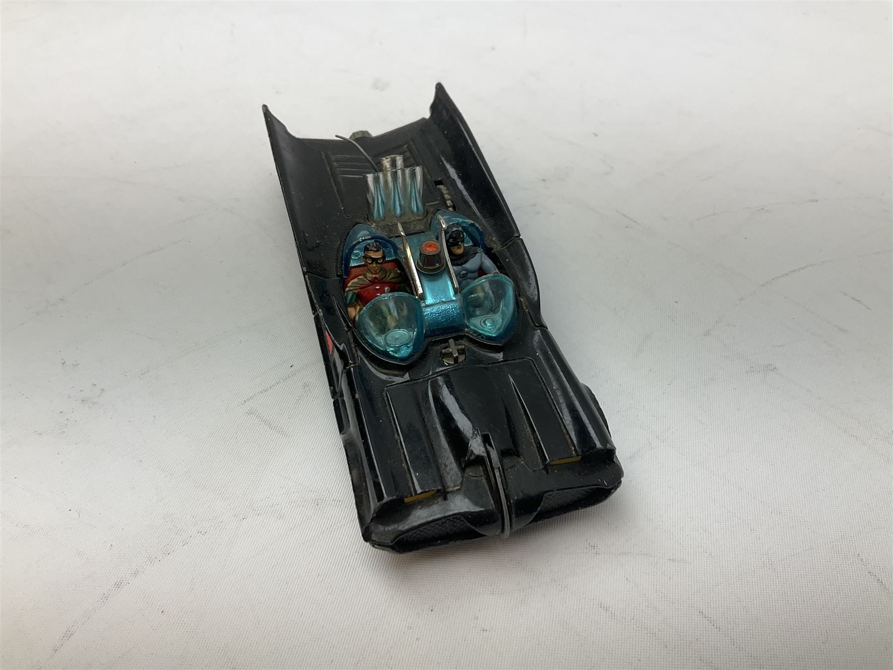 Twenty unboxed and playworn die-cast models including Dinky Guy van Golden Shred, Buick Riviera, Austin A105, Hillman Imp etc; Corgi Batmobile, Monkeemobile, Man From Uncle Oldsmobile Super 88, Airborne Caravan, Ford Mustang etc; Spot-On Humber Super Snipe Estate car; Schuco Micro Racer 1038 clockwork Mercedes 220S etc