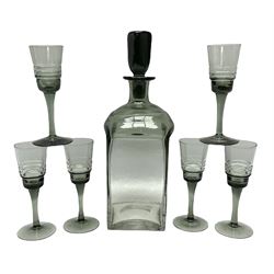 20th century smoked glass decanter of square sided form, together with six smoked glass drinking glasses, in one box 