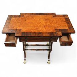Early 19th century Regency burr elm work table, rosewood crossbanded top with notched corners above shaped end supports united by a turned stretcher, on brass paw feet and castors, stamped W Mason on lower turning