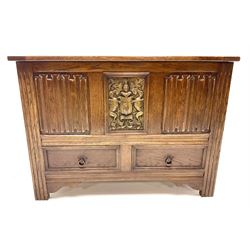 Late 20th century oak mule chest, single hinged lid above two drawers, carved panel front