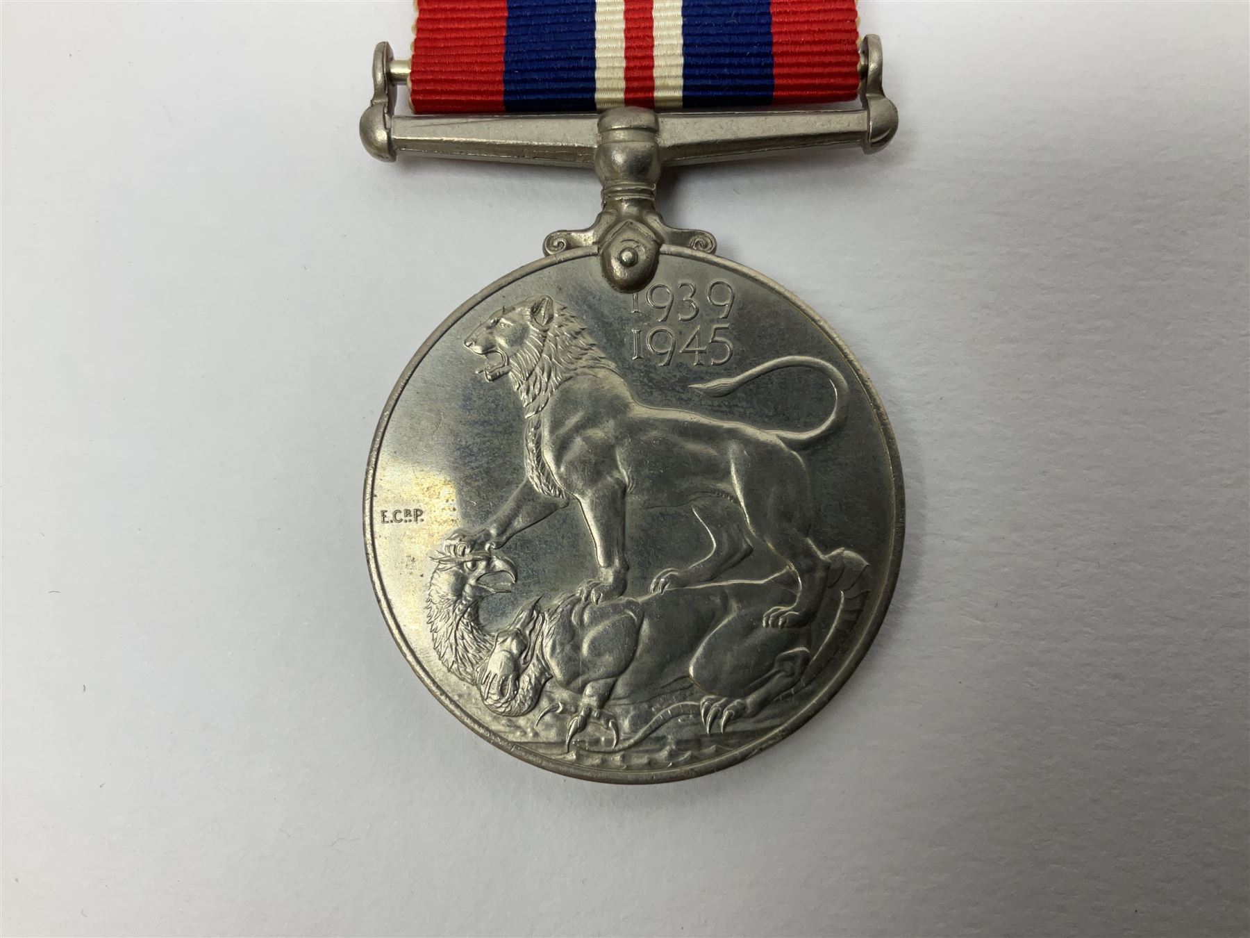 WW1 group of three medals comprising British War Medal, Victory Medal and 1914 Star awarded to 8328 Pte. G. Shaw Yorks: L.I.; on hanging bar with WW2 1939-1945 War Medal and WW1 ribbon bar with rosette to 1914 Star ; all with ribbons; and WW2 1939-1945 War Medal with ribbon