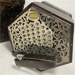 Wheatstone & Co McCann duet system concertina, no 25549, circa 1912, with fifty five metal buttons, hexagonal and chrome plated fretwork ends and six fold bellows, bearing plaque C Wheatstone & Co Inventors, Patentees & Manufacturers 15 West St, Charing X Rd, London; WC, with original case