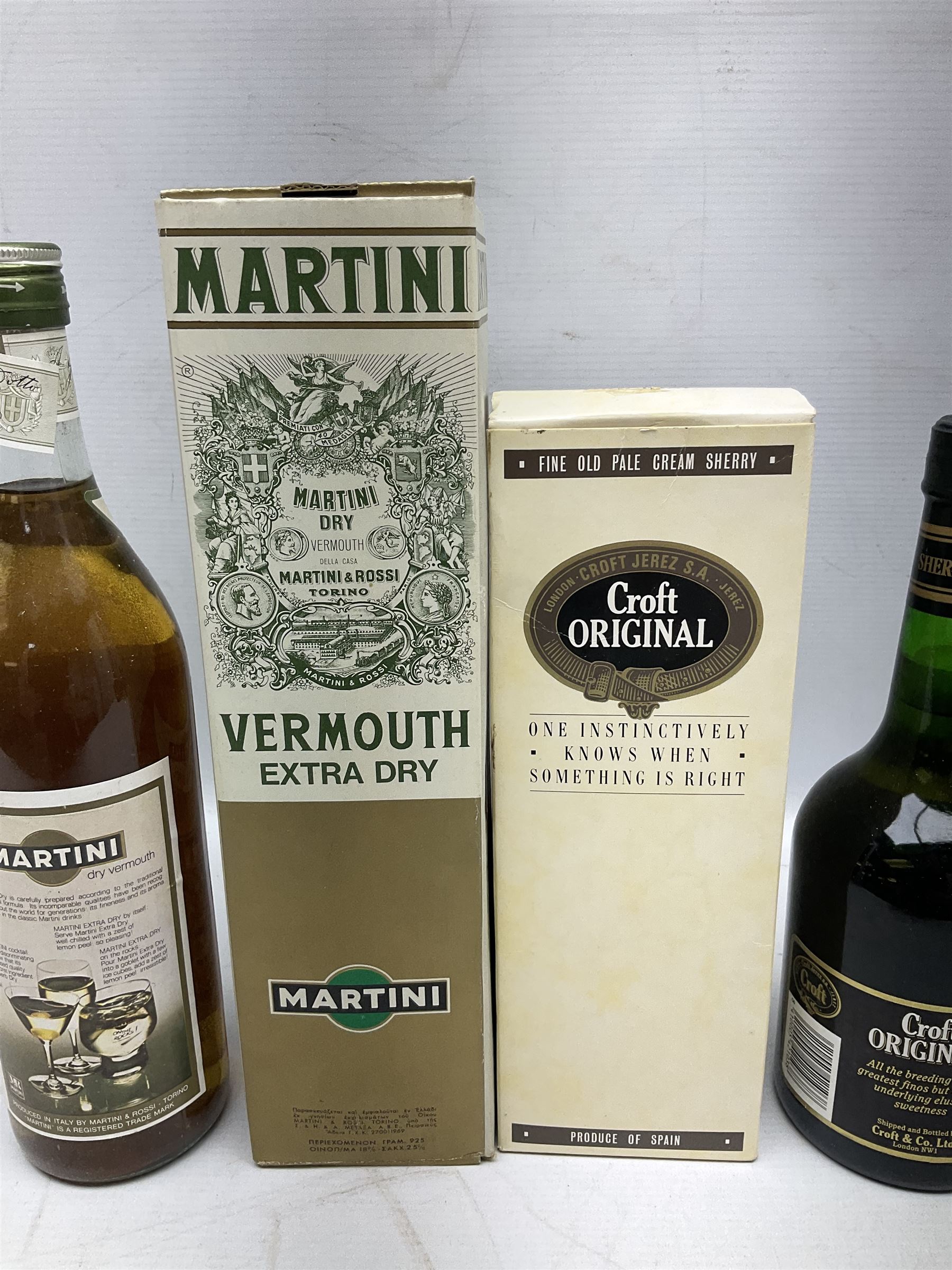 Mixed alcohol comprising Harveys Medium Dry Sherry, 70cl, one bottle, Croft Original Fine Old Pale Cream Sherry, 70cl, one bottle in box, Martini Extra Dry Vermouth, 90cl 18% vol, one bottle in box, Cockspur Barbados V.S.O.R Fine Rum, one bottle, and Baileys Irish Cream, 1l, one bottle (5)