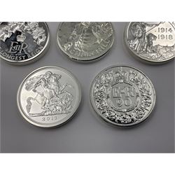 Seven Queen Elizabeth II United Kingdom fine silver twenty pound coins comprising 2014 ‘Honour the Fallen of WWI’, 2015 ‘Longest Reigning Monarch’ and ‘Winston Churchill’, 2016 ‘The Nativity Story’, ‘The 90th Birthday of Queen Elizabeth II’ and ‘The Welsh Dragon’, and 2018 ‘St. George and the Dragon’ 