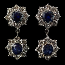  Pair of 18ct gold white gold sapphire and diamond double cluster pendant ear-rings, stamped 750  