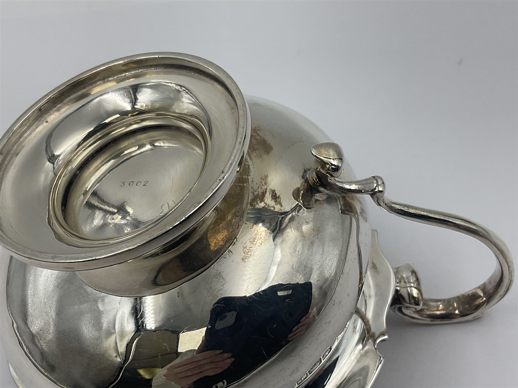 1920s five-piece silver tea service, comprising teapot, coffee pot, hot water pot, twin handled open sucrier and milk jug, each of squat circular form with shaped rim, the teapot, coffee pot and hot water pot each with ebonised handle and finial, the sucrier and milk jug with acanthus capped scroll handles, all upon circular foot, hallmarked R F Mosley & Co, Sheffield 1926 & 1927, tallest H24cm