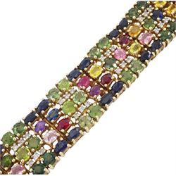 9ct gold sapphire, ruby and diamond bracelet, vari-cut blue fancy coloured sapphires, oval cut rubies and round brilliant cut diamonds, Birmingham 2006