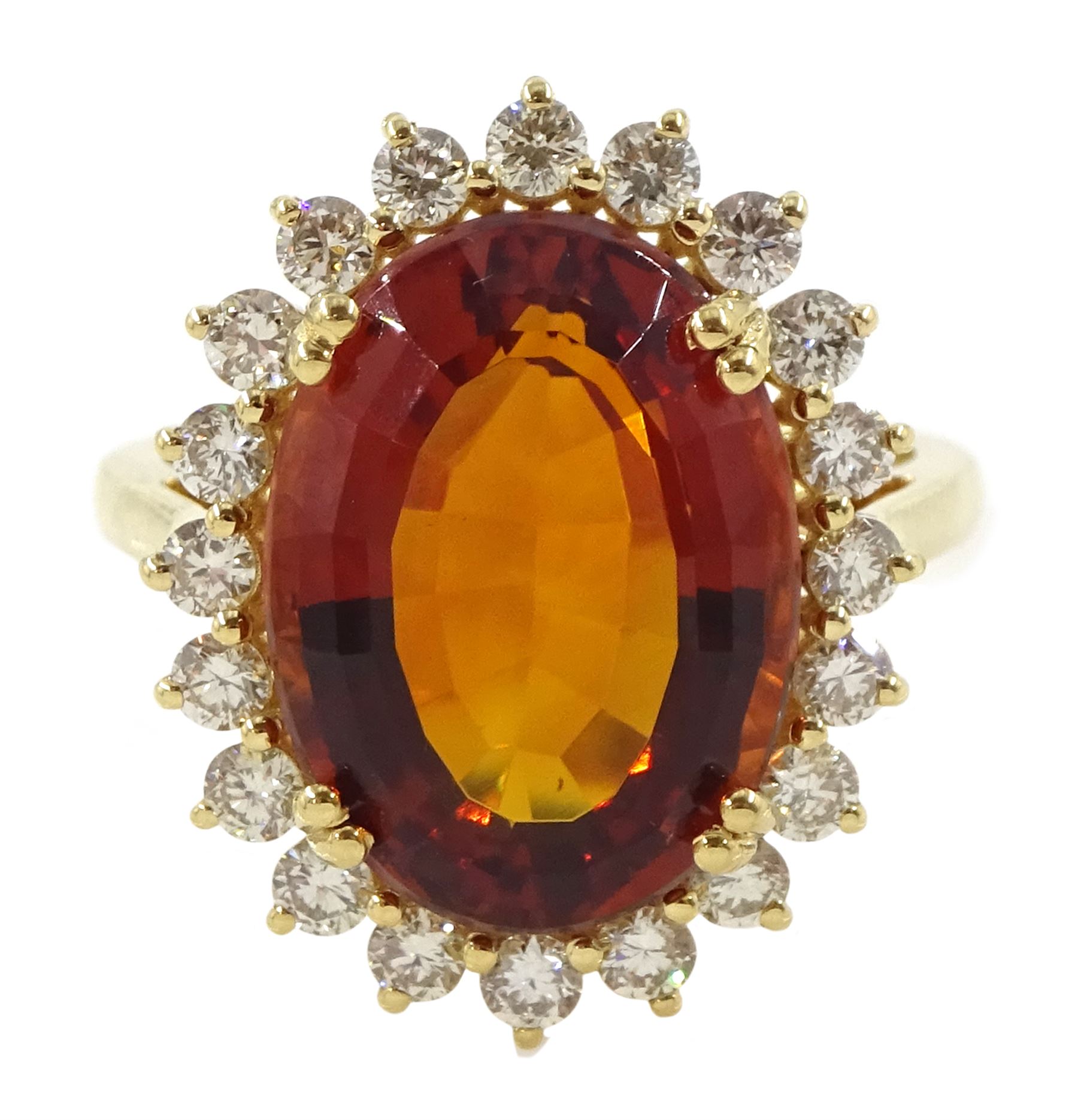 18ct gold citrine and diamond cluster ring, single oval cut citrine of approx 7.35 carat, with round brilliant cut diamond surround, stamped, total diamond weight approx 0.75 carat