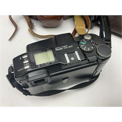 Collection of cameras and lenses, to include Pentax Program A camera body, serial no 123759, with 'Pentax-A zoom 1:3.5-4.5 28-80mm' len, Praktica EE2 camera body with 'Pentacon electric 1.8/50' lens etc, together with a Manfrotto tripod 