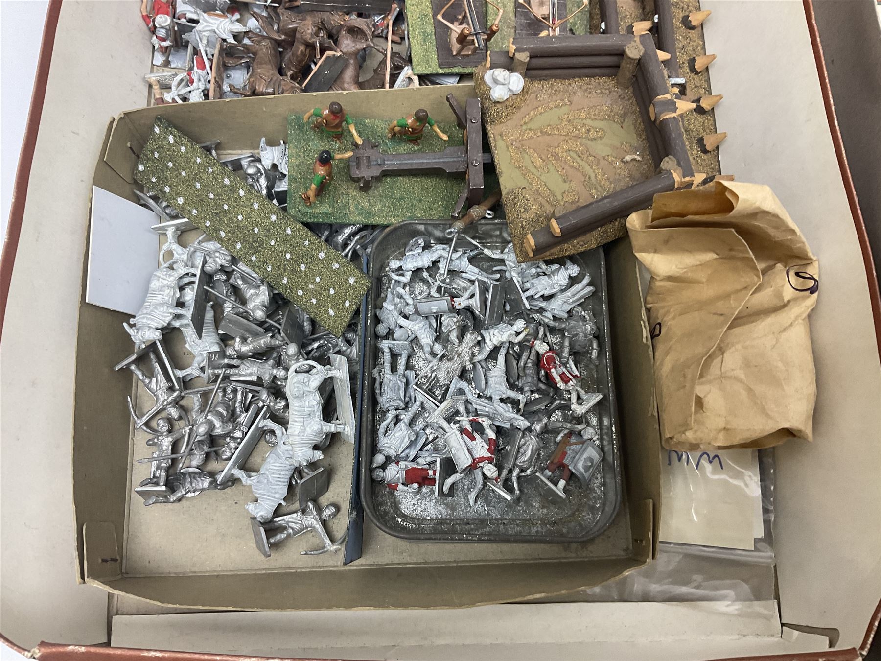 Painted metal wargame figures - over four hundred including Normans and Saxons, Romans, British Tribes etc; together with a quantity of part-painted and unpainted figures, battlefield weapons and accessories etc; average size 25mm