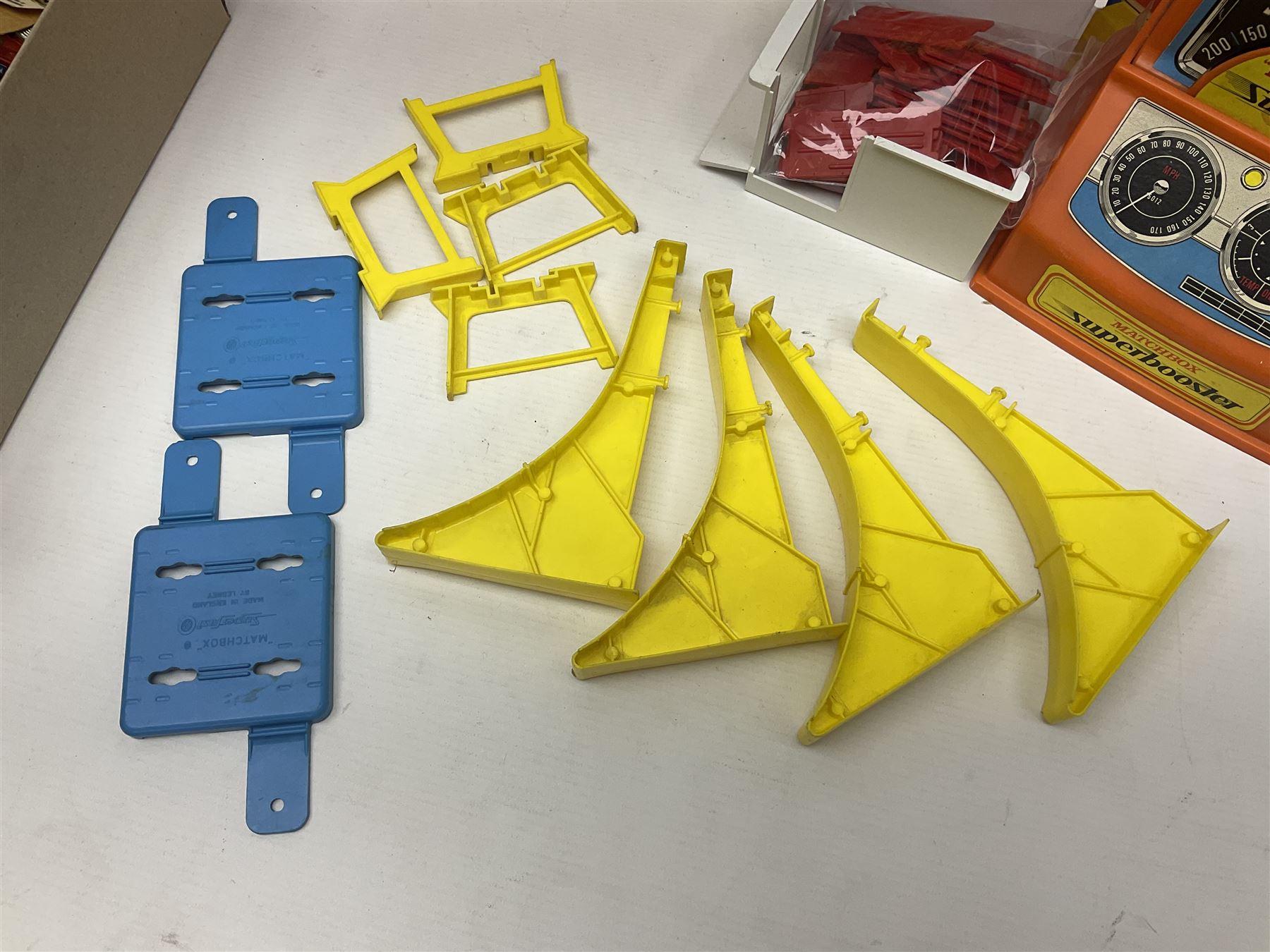 Matchbox Superfast track racing Set with Superbooster and two boxed SF-17 Slipstream Curves; together with five boxed Superfast models - 3d Monteverdi Hai, two 7d Hairy Hustler, 45c Ford Group 6 and 66d Mazda RX500; and quantity of unboxed and playworn other die-cast models