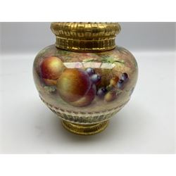 Mid 20th century Royal Worcester potpourri vase and cover decorated by M Johnson, of ovoid form with inner cover and pierced gilt outer cover with bud finial, upon short gilt circular foot, the body part moulded with basket weave bands in gilt and bronze, and hand painted with a still life of fruit upon a mossy ground, signed M Johnson, with black printed mark beneath and painted shape number 1286, H19.5cm