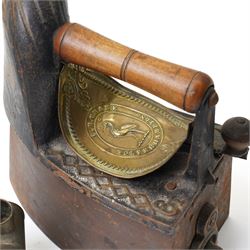 Chimney iron by Crane of Wolverhampton ,Feldmeyer type flat iron with spirit tank, another flat iron, hatters flooster iron and one other milliners iron (5)