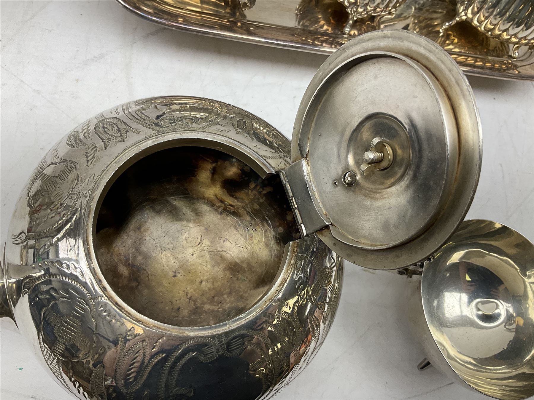 Early 20th century hallmarked silver trumpet vase stamped J & R Griffin (Joseph & Richard Griffin), Chester 1917, with weighted base, together with a 19th century silver-plate biscuit barrel by JK&Co, ornately engraved throughout, John Round & Son silver plated twin handled cup, and other silver plated and other metal ware to include ornate teapots, tray etc