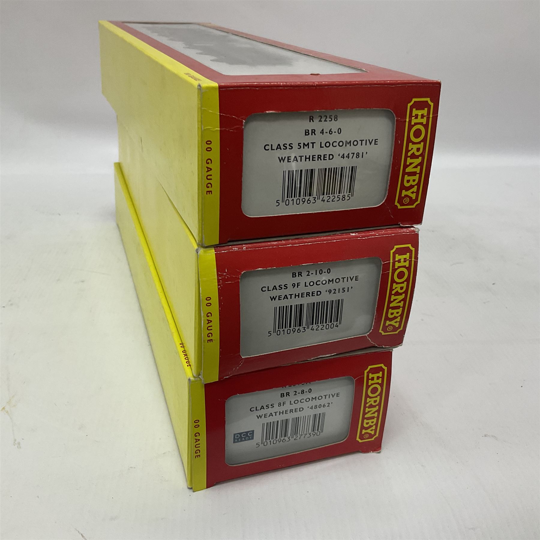 Hornby ‘00’ gauge - three ‘weathered’ locomotives comprising Class 8F 2-8-0 locomotive no.48062 in BR black; Class 9F 2-10-0 locomotive no.92151 in BR black; Class 5MT 4-6-0 locomotive no.44781 in BR black; in original boxes (3) 