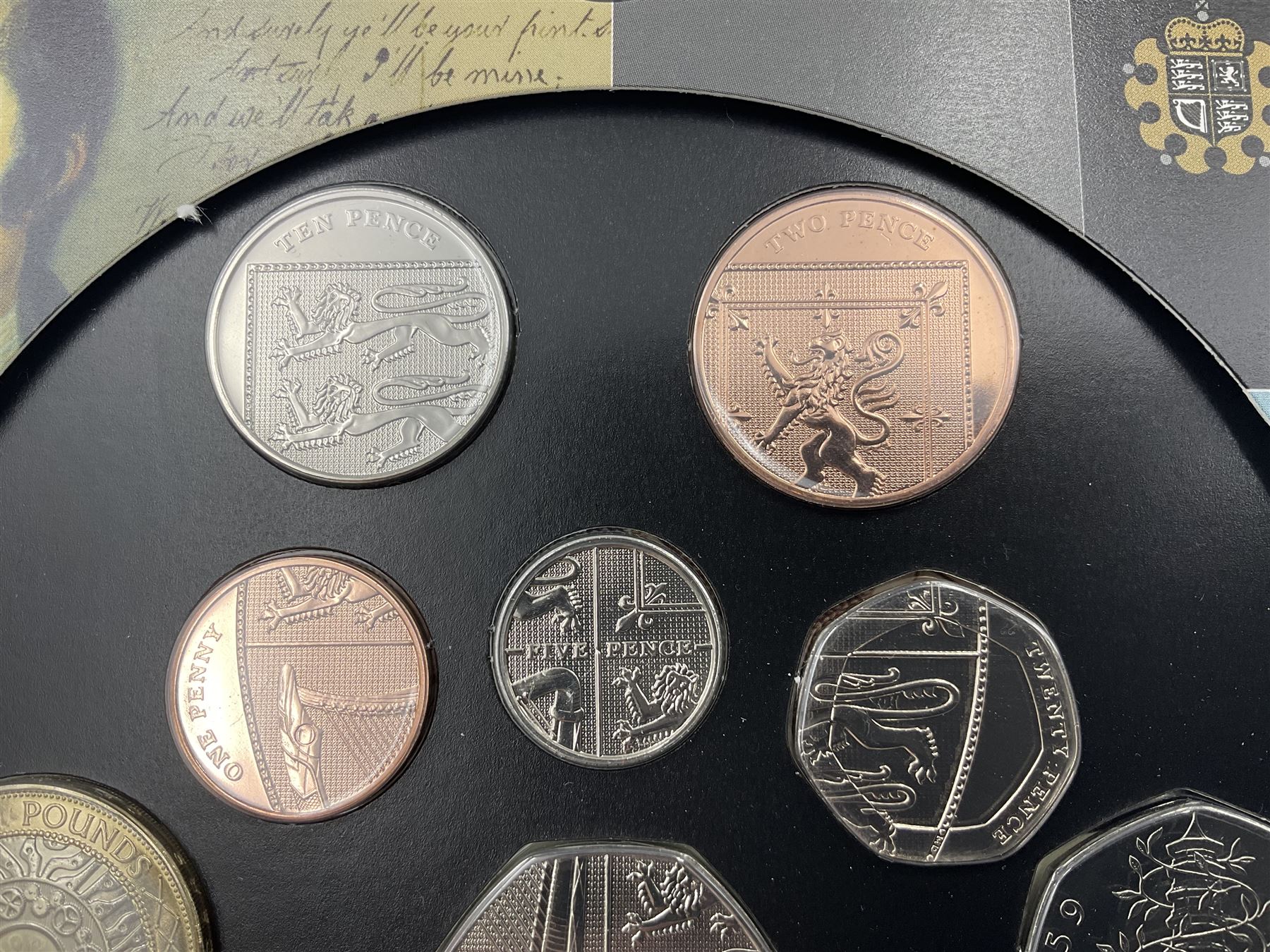 The Royal Mint United Kingdom 2009 brilliant uncirculated coin collection, including Kew Gardens fifty pence, in card folder